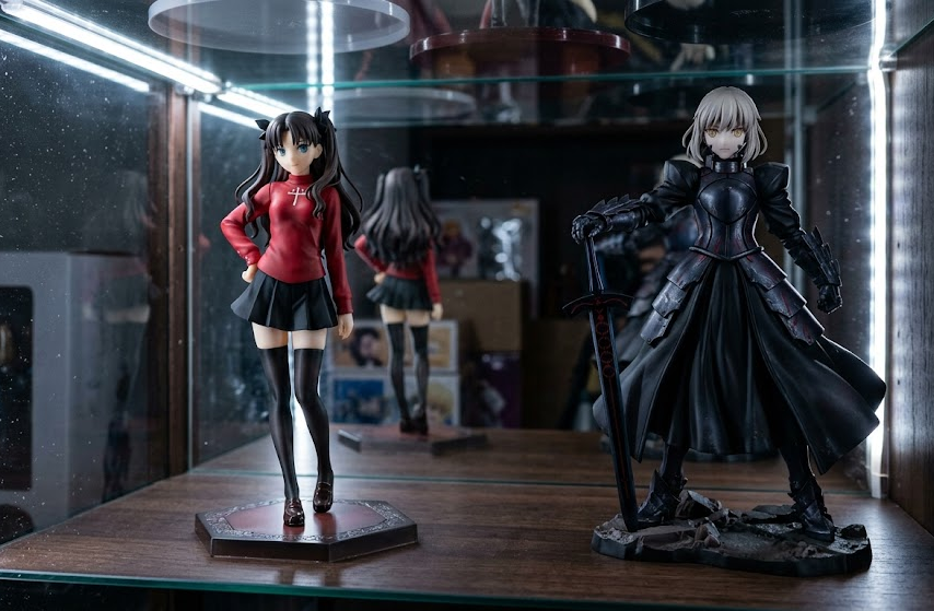 Comparison of front-edge and side lighting inside an anime figure display cabinet
